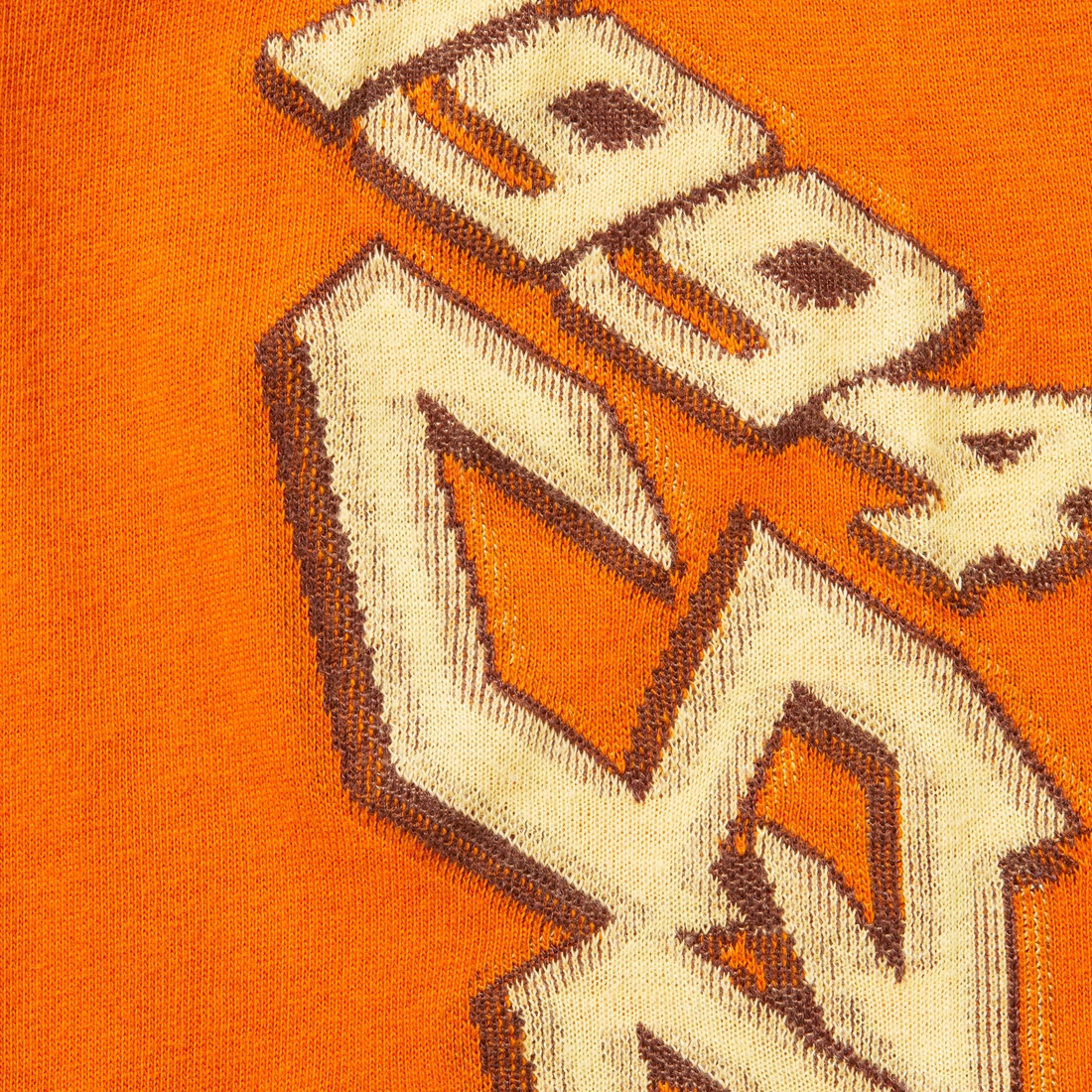 Supreme Racing Intarsia L S Top (FW23) - Burnt Orange - $98